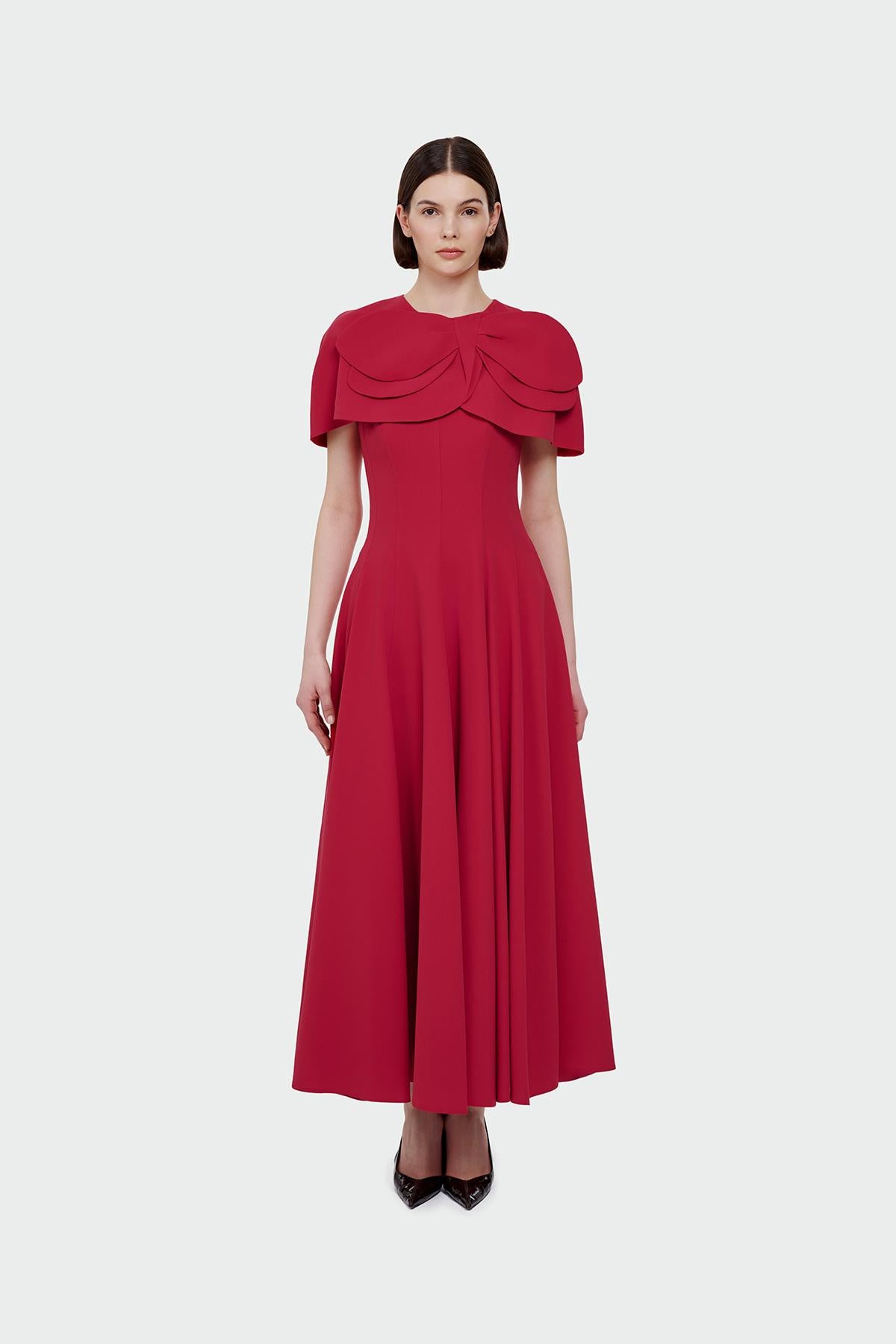 فستان سهرة بدون حمالات مع تنورة واسعة وتفاصيل بوليرو