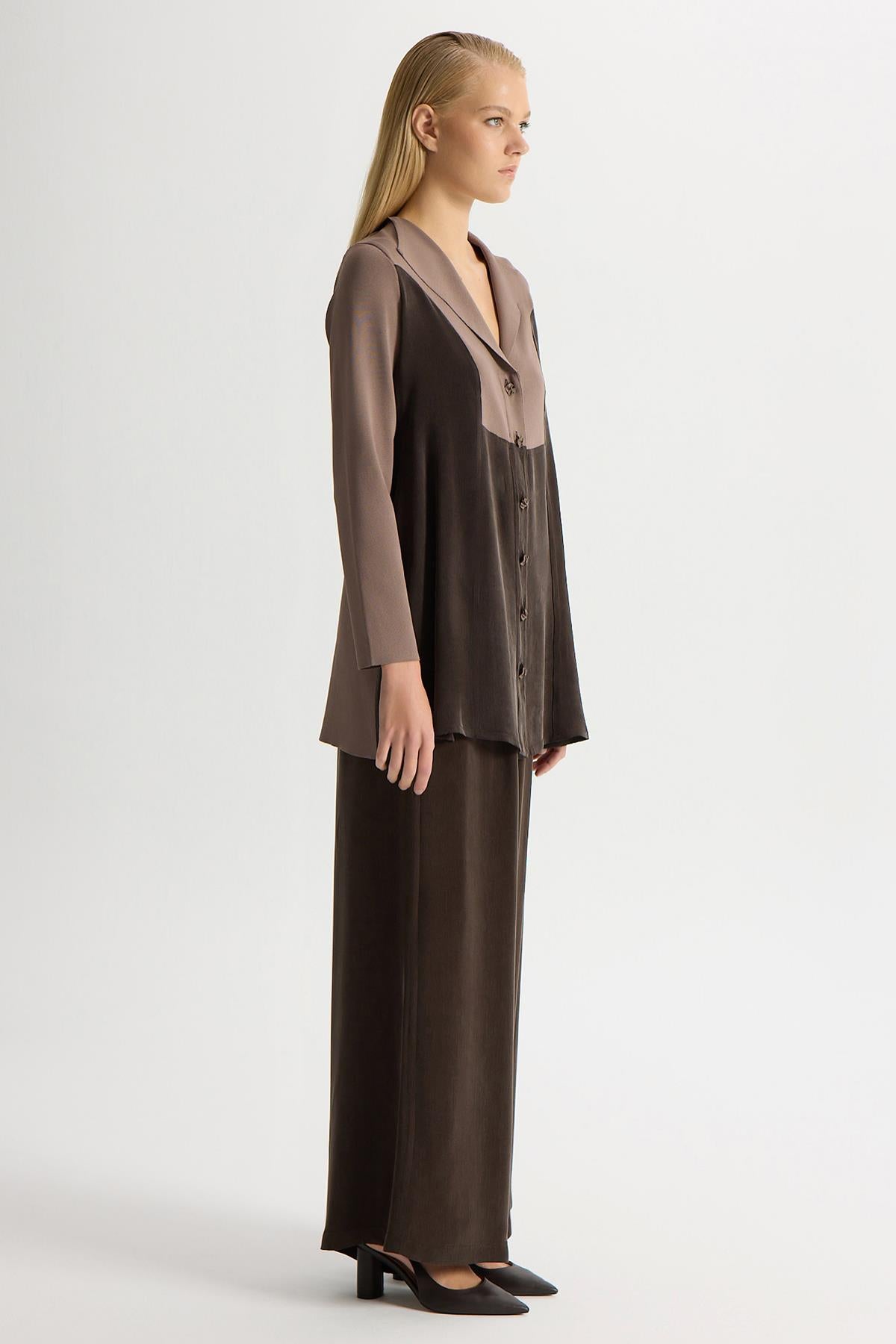 بنطال واسع الساقين من الكوبرو مع جيوب