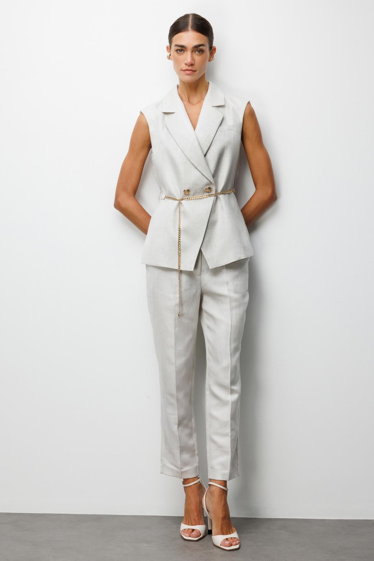 Double-breasted linen vest with chain belt