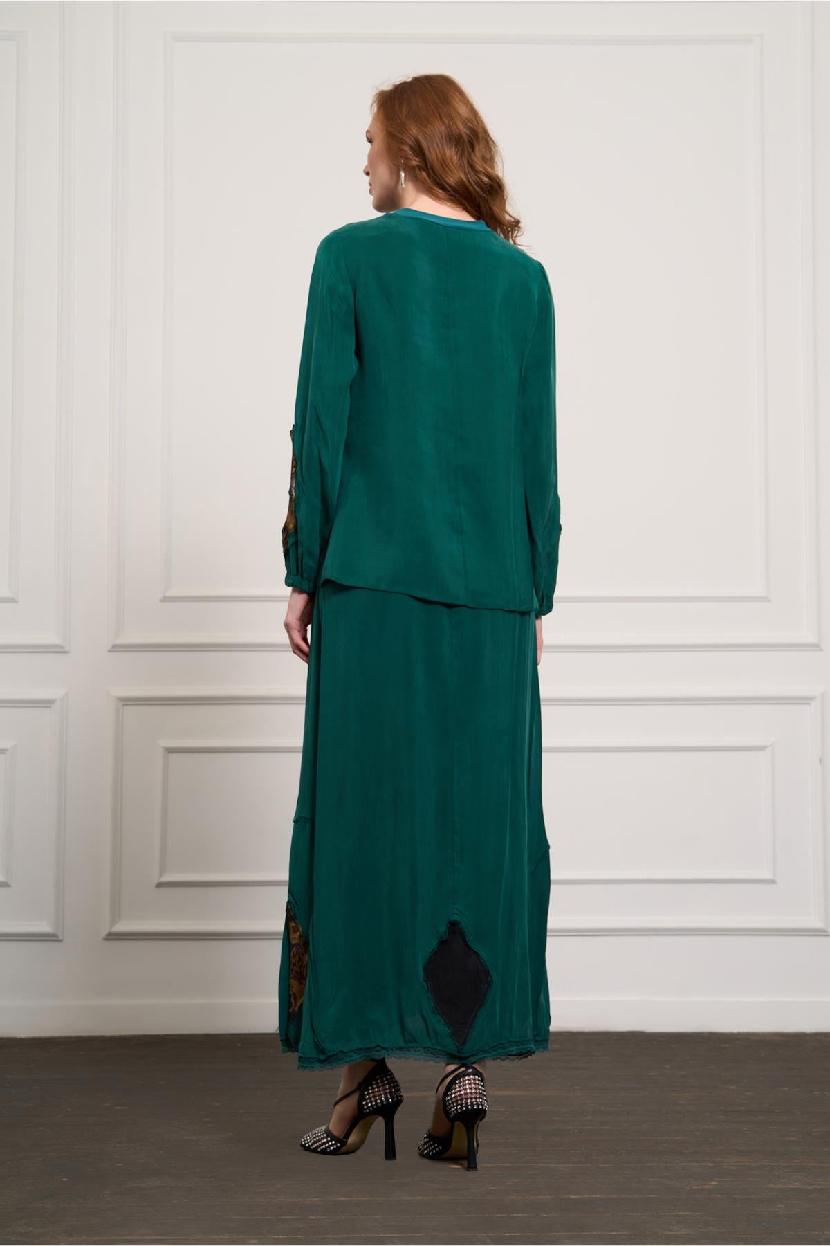 طقم تنورة تونيك بتفاصيل مرقعة