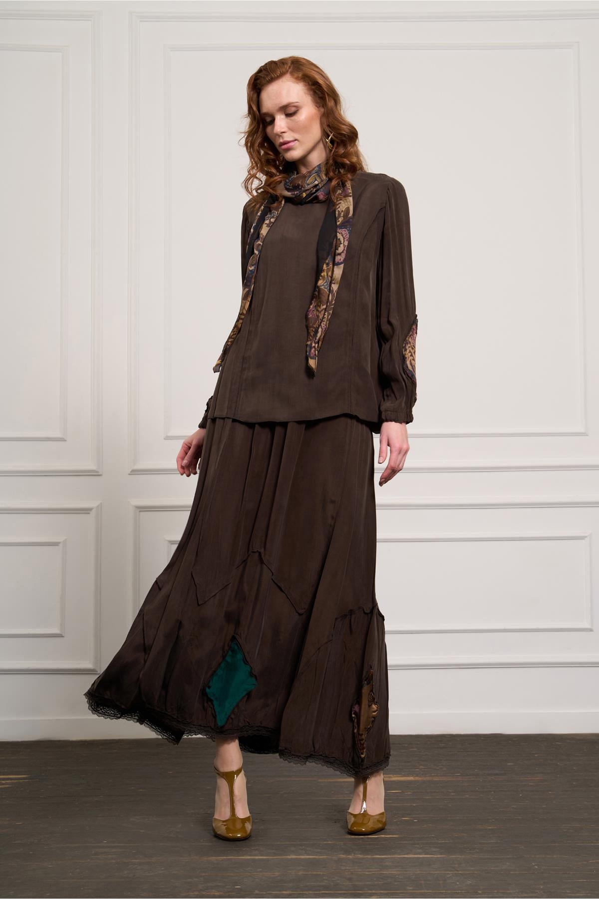 طقم تنورة تونيك بتفاصيل مرقعة