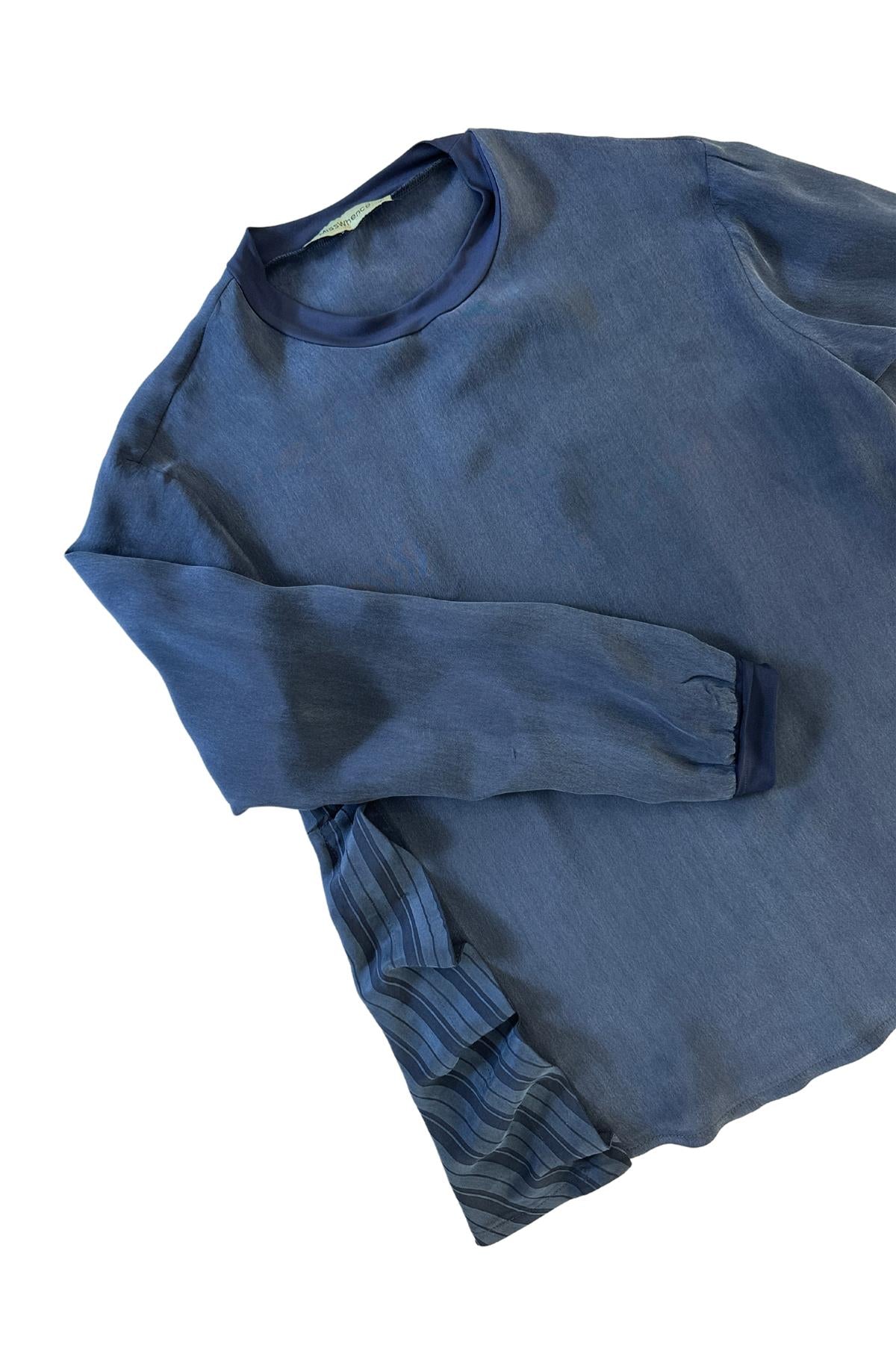 طقم تونيك وتنورة من الكوبرو بتفاصيل كشكشة جانبية