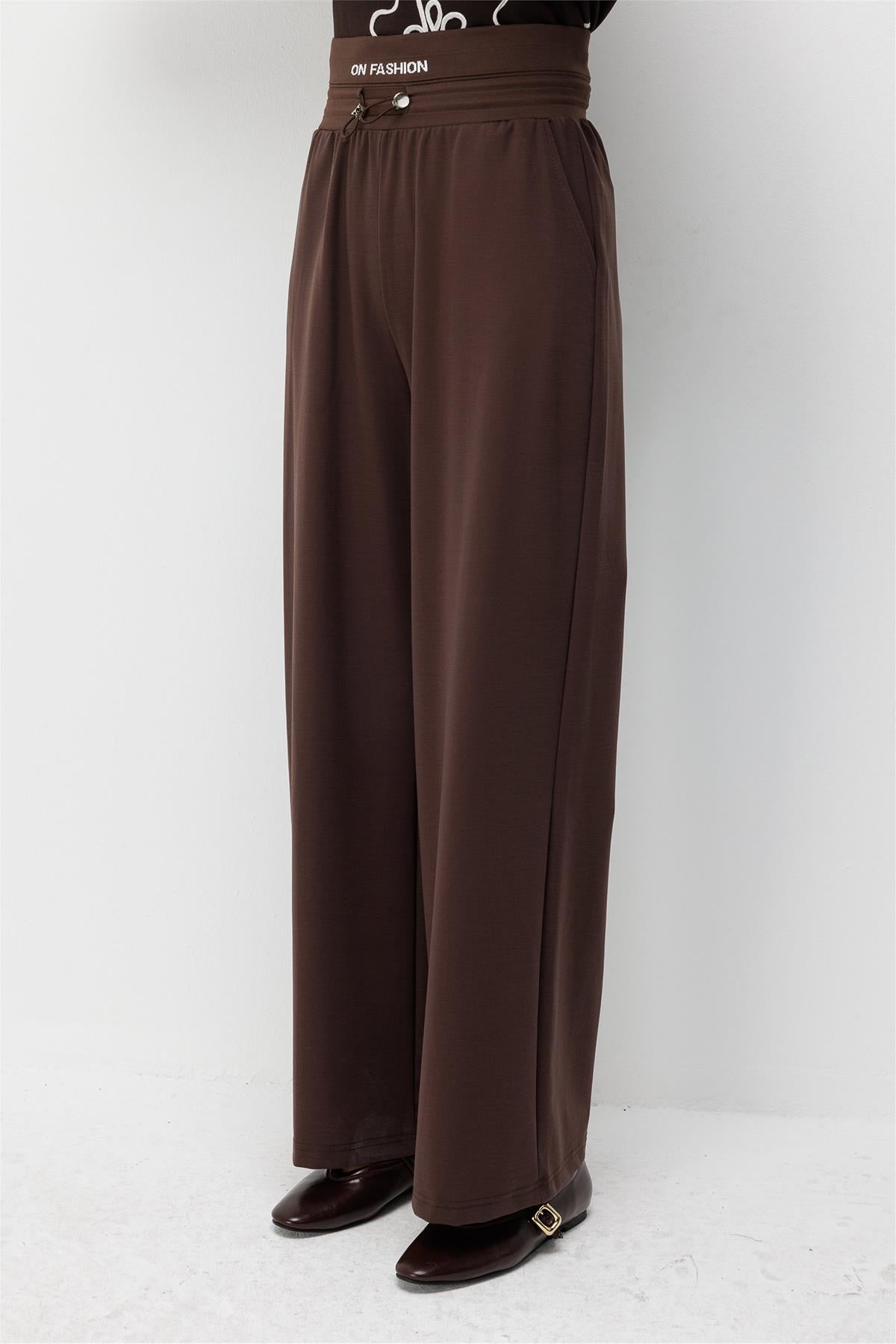 Beli Yazı Detaylı Lastikli Bol Paça Pantolon