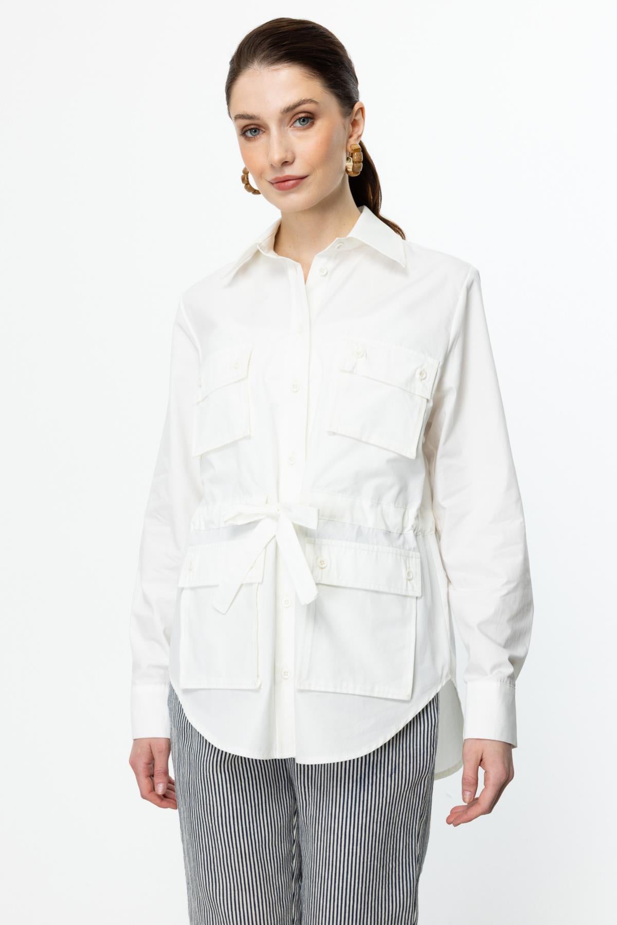 سترة بأكمام طويلة ومربوطة حول الخصر