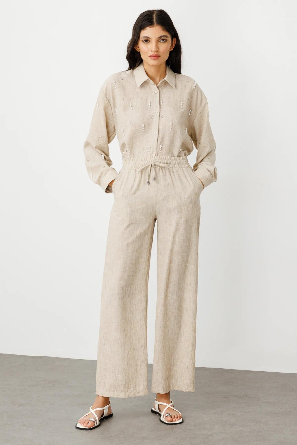 بنطلون كتان واسع الساق