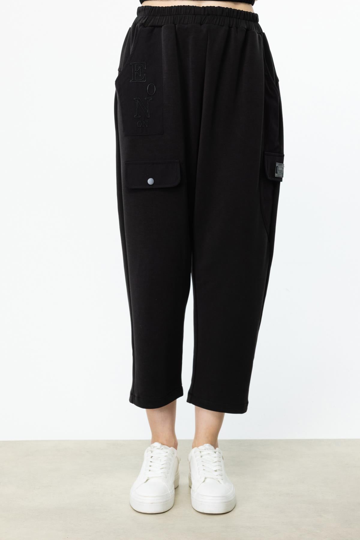 Beli Lastikli Yazı Detaylı Pantolon