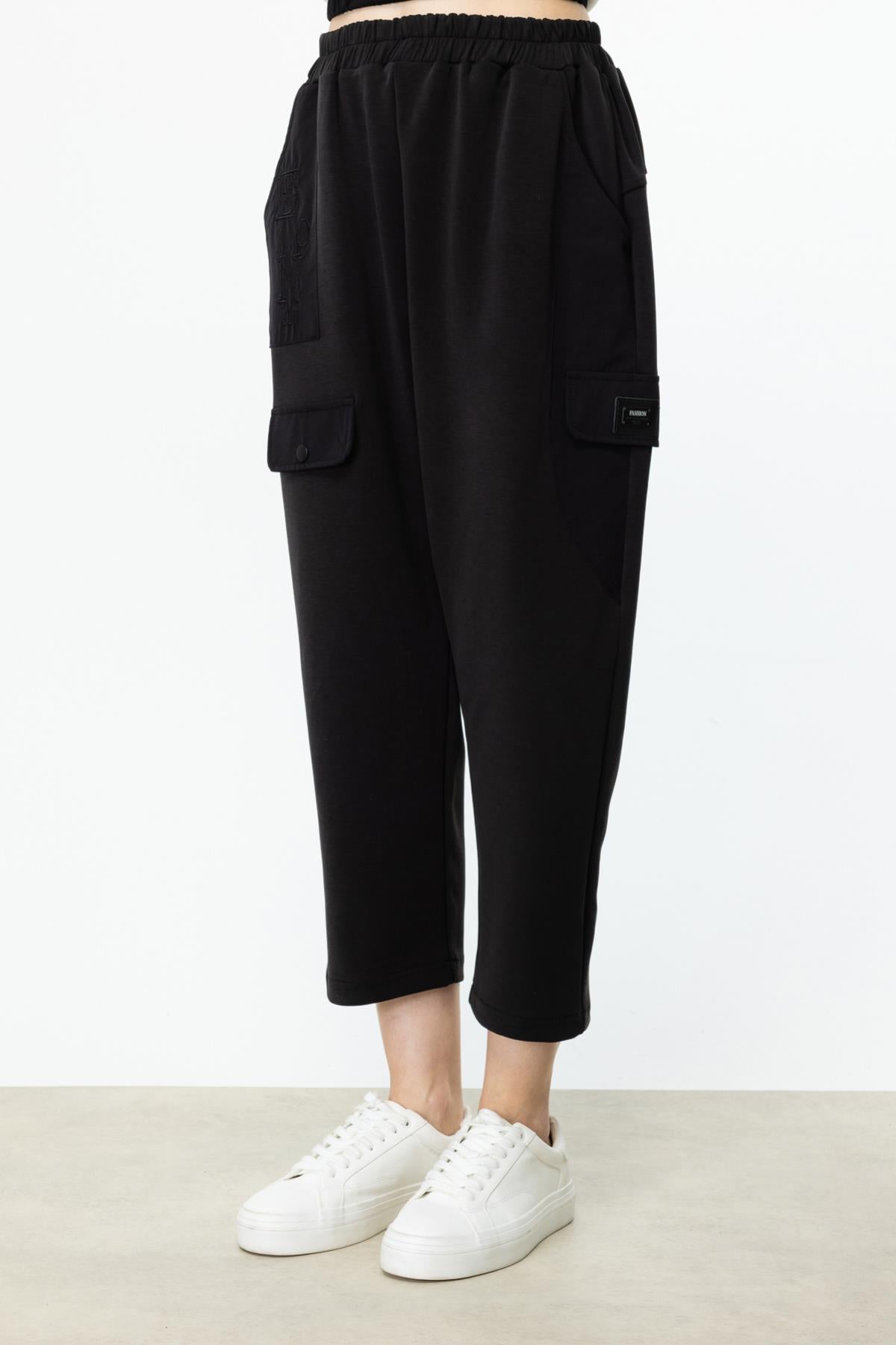 Beli Lastikli Yazı Detaylı Pantolon