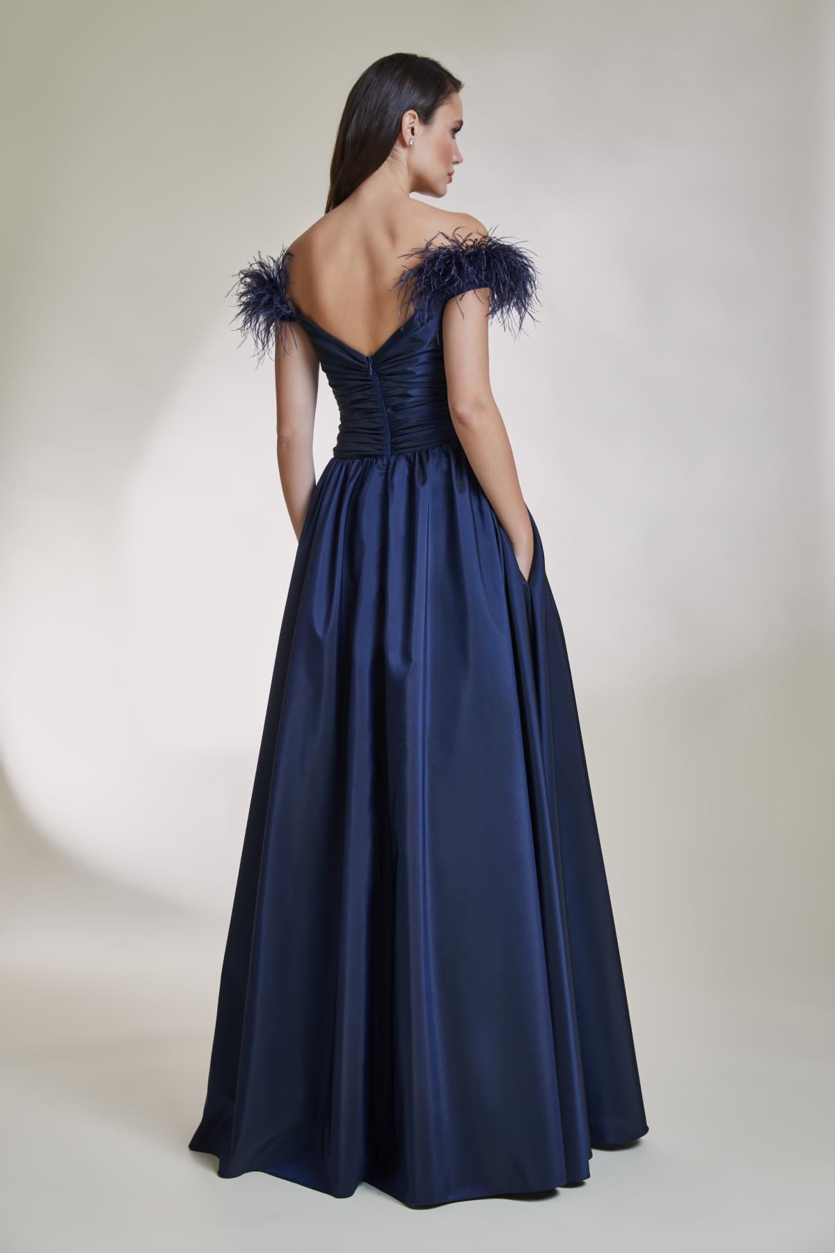 A Cut Long Evening Dress with Pleated Collar and Window