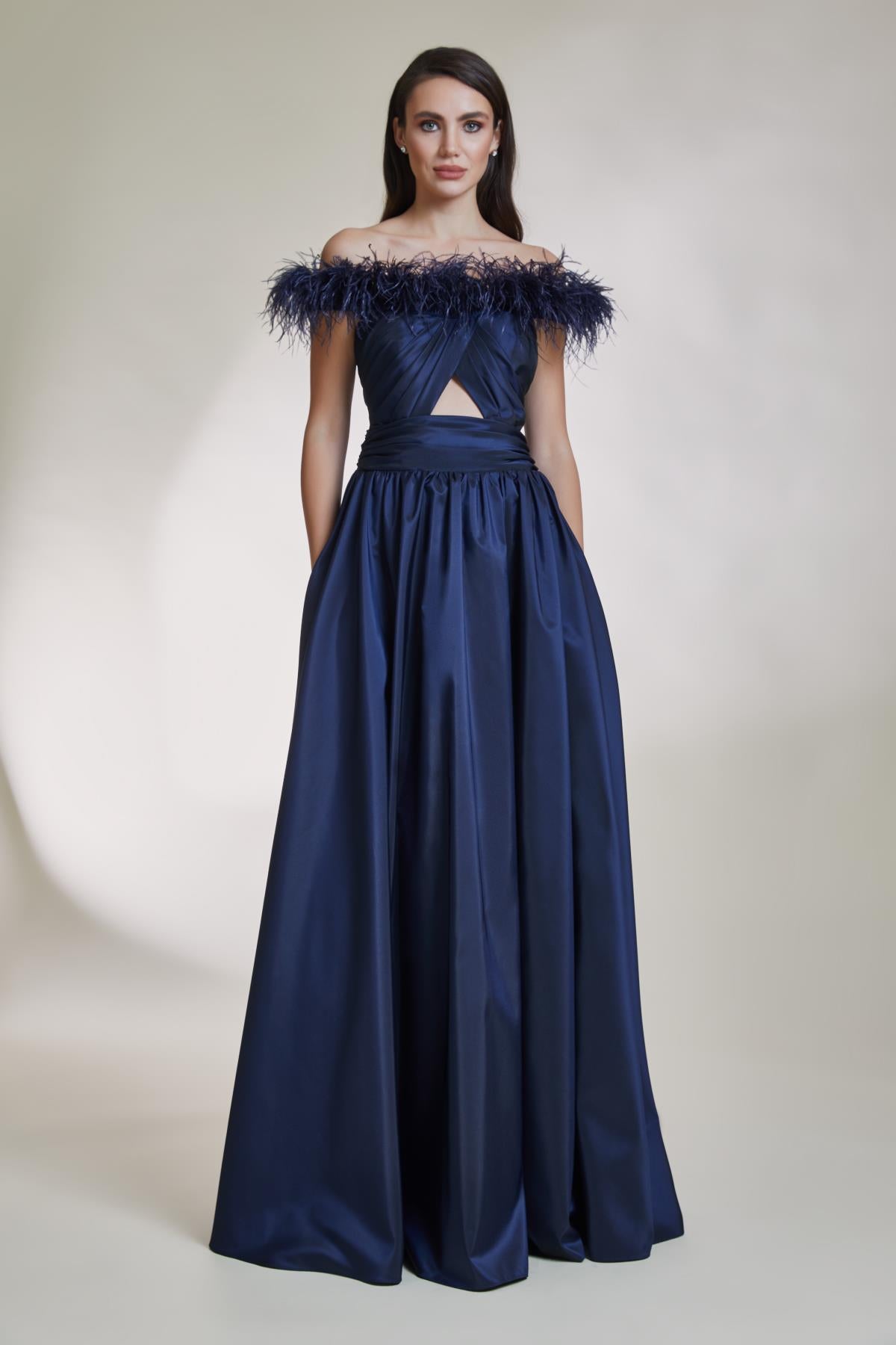 A Cut Long Evening Dress with Pleated Collar and Window