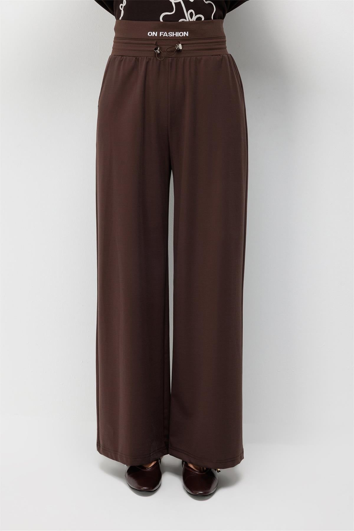 Beli Yazı Detaylı Lastikli Bol Paça Pantolon