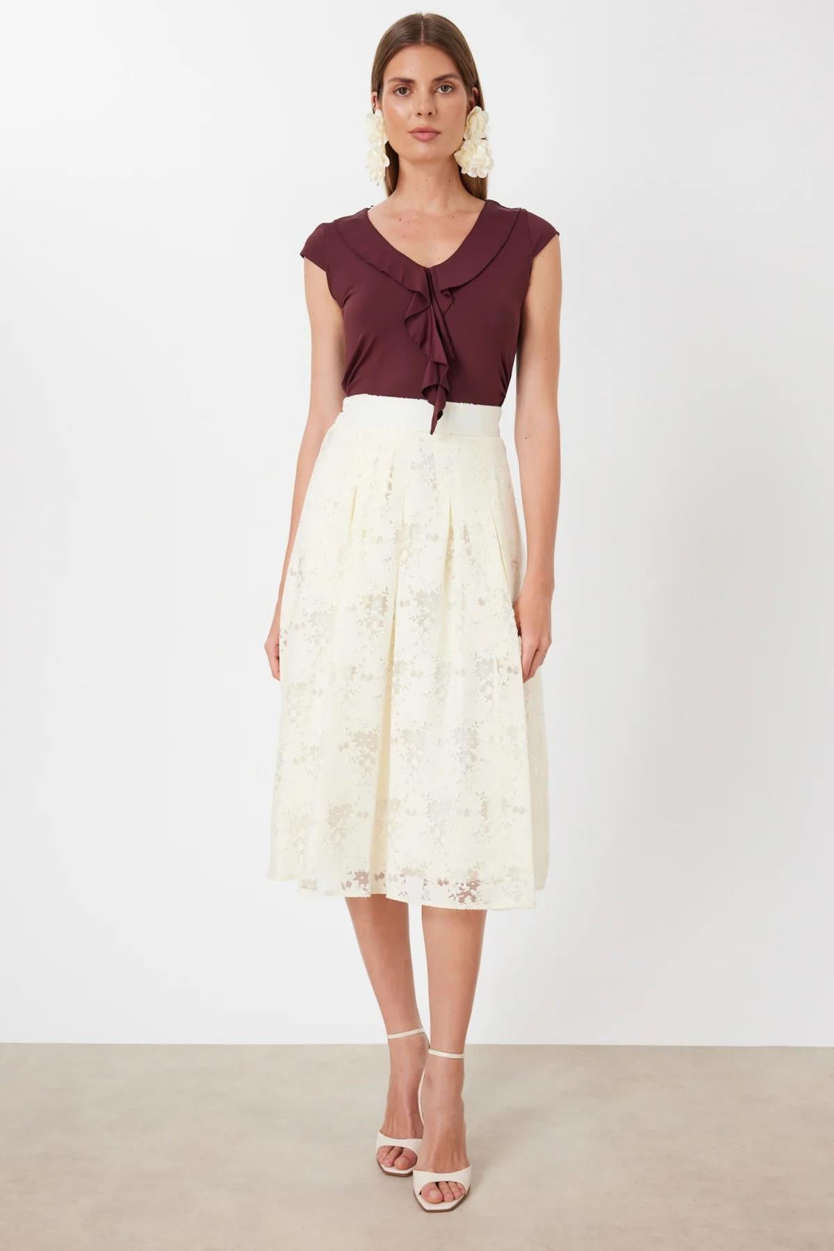 Desenli Pileli Midi Etek